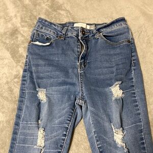 Women ripped skinny jeans